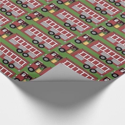 普通消防車のパーティーを運転するクリスマスサンタはwraをタイルを張りました ラッピングペーパー (角)