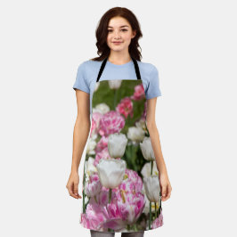 晴れた日の明るい白とピンクのチューリップ エプロン