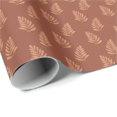 暖かい茶色の背景に葉の模様があり ラッピングペーパー (ロールコーナー)
