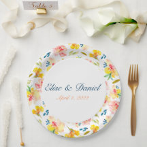 暖かい黄色とピンクの水の色のフローラプレート