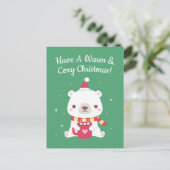 暖かく居心地の良いクリスマスのホッキョクグマを持っている ポストカード (スタンド正面)