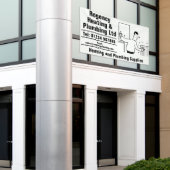 暖房と配管 横断幕 (ビルの外側)