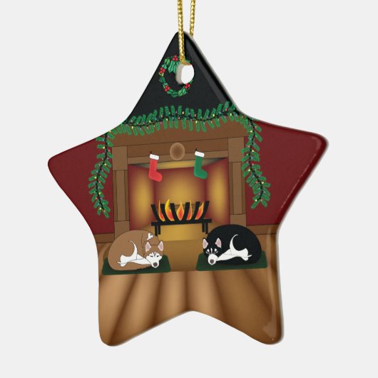 暖炉のオーナメントによって眠っている休日のハスキー セラミックオーナメント (左)