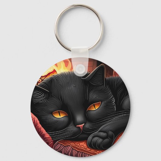 暖炉の前に寝そべっている黒猫 キーホルダー (正面)