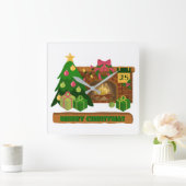 暖炉の焚き火のクリスマスツリーの近くでメリークリスマス スクエア壁時計 (ホーム)