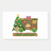 暖炉の焚き火のクリスマスツリーの近くでメリークリスマス ポストイット (正面)