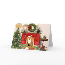 暖炉クリスマスカードの前のキツネ