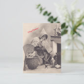 暖炉離れのクリスマスにサンタのプレゼント ポストカード (スタンド正面)