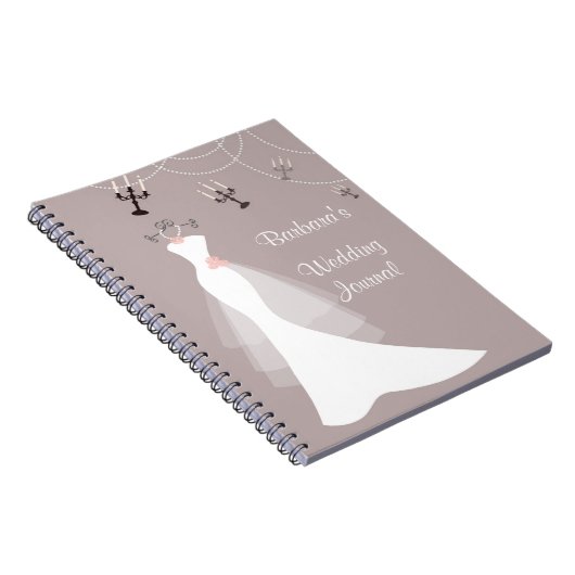 暗いピンクのウェディングプランナーのノートの白いガウン ノートブック (右側)