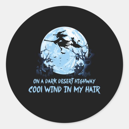 暗い砂漠の幹線道路で箒に乗る魔女 ラウンドシール (正面)