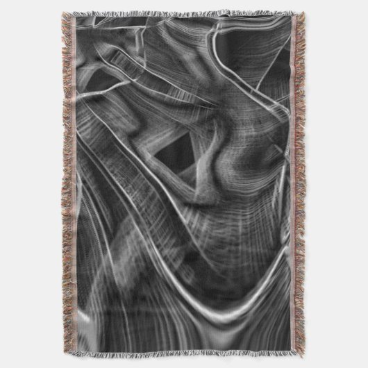 暗い背景に灰色の溝が多くねじれている スローブランケット (正面縦)