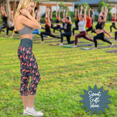 暗い背景に緑のピンクのサンゴの羽 カプリレギンス