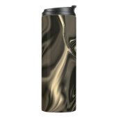 暗い背景の上の金属のセピアの起伏 タンブラー (回転左)