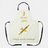 暗い金ゴールドのピンと転がハーブモチーフを持つアイボリー エプロン (正面)