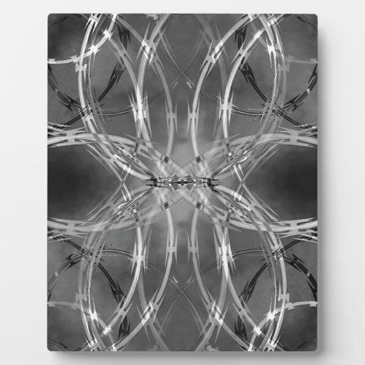 暗い雲に対するかみそりのワイヤ フォトプラーク (正面)