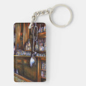 暗黙に理解される キーホルダー (裏面)