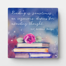 書籍とピンクローズウォーター色スクリプト読の引用文