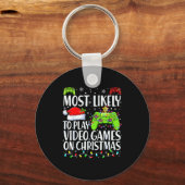 最もクリスマスにビデオゲームをプレイしそう キーホルダー (正面)