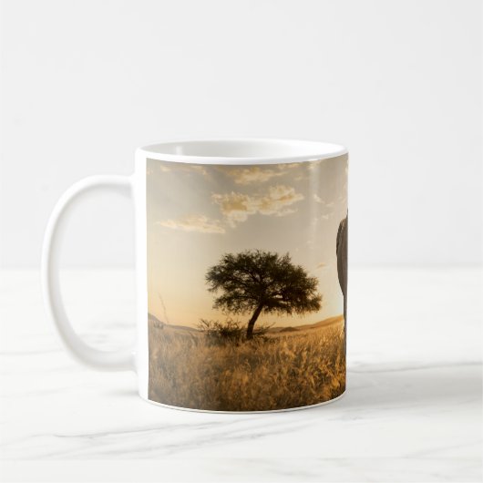 最も可愛い赤ん坊の動物 |ゾウの子牛と母 コーヒーマグカップ (左)