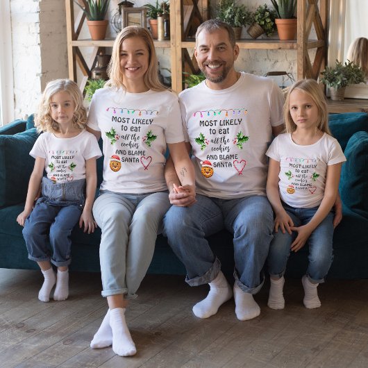 最も可能性が高い食べすべてのクッキーとサンタ Tシャツ