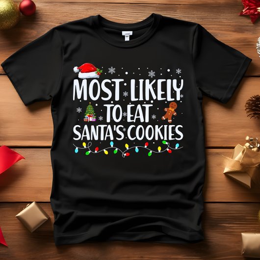 最も可能性が高い食べすべてのサンタクッキーのクリスマス Tシャツ