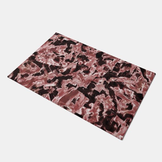 最も暗い赤の上に浮いている銅または岩のブレード ドアマット (アングル)