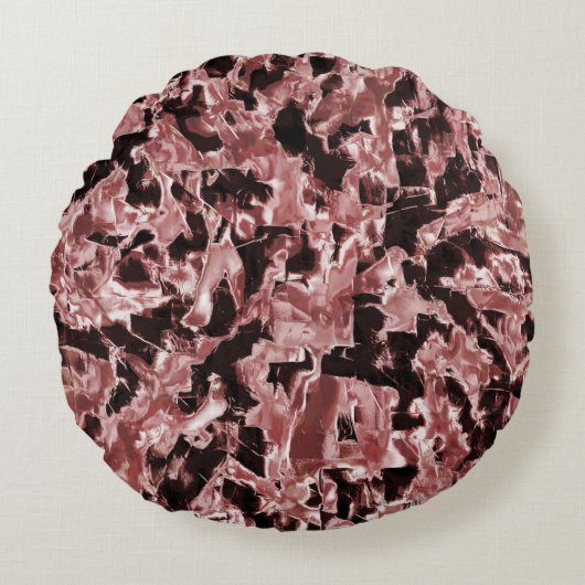 最も暗い赤の上に浮いている銅または岩のブレード ラウンドクッション (正面)