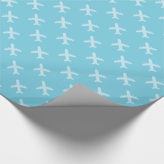 最小主義のモダンな飛行機のシルエットパターン青 ラッピングペーパー (角)