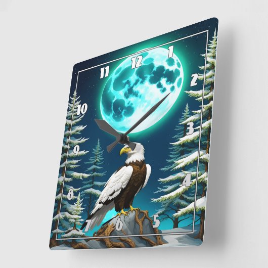 月に照らされた冬の空の下に止まったワシ スクエア壁時計 (傾斜)