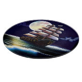 月の下の海に照らされた船 カッティングボード (角)