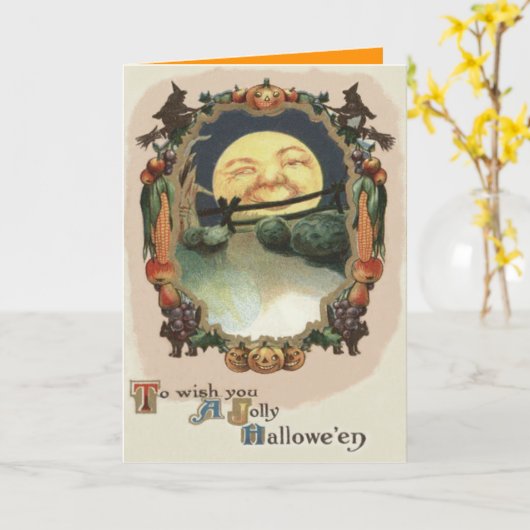 月の中の男ハロウィーンのカボチャのちょうちん魔女 カード (黄色い花)