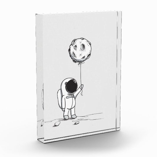 月の気球の宇宙が付いている宇宙の宇宙飛行士は主演します フォトブロック (左)