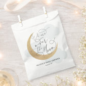 月の赤ちゃんシャワーの上に青 フェイバーバッグ (クリップ留めされた状態)