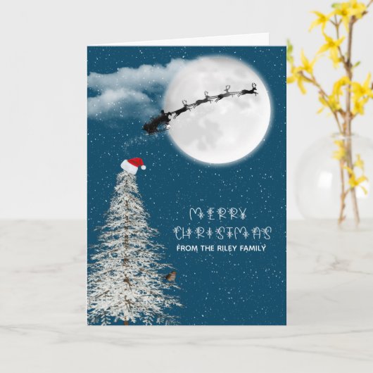 月明かりの中でサンタとトナカイをシルエット カード (黄色い花)