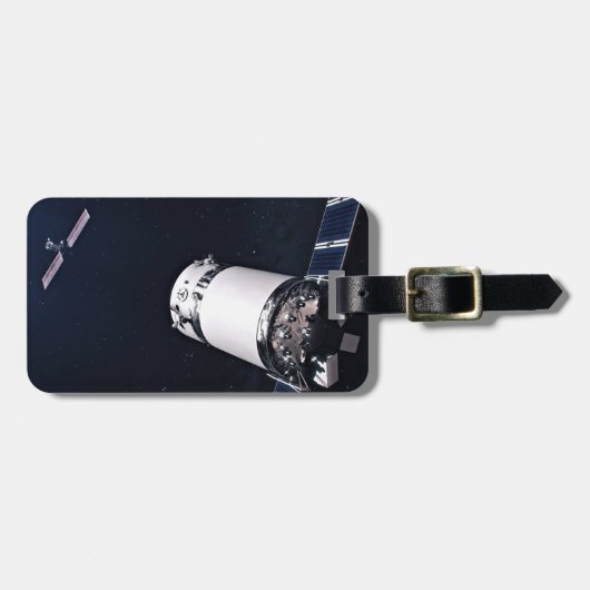 月面の門に近づくドラゴンxl宇宙船。 ラゲッジタグ (正面横)