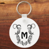 有刺鉄線包まれたモノグラムの馬蹄形 キーホルダー (正面)