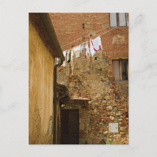 服ぶら下がったは物干し線で乾く ポストカード (正面)