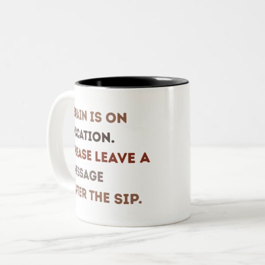 朝おもしろいとカフェイン好きのコーヒー引用文 ツートーンマグカップ (正面左)