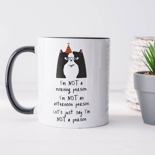 朝おもしろいの人ではない マグカップ