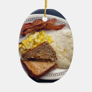 朝食のタイムのベーコンはトーストの屑に卵を投げつけます セラミックオーナメント