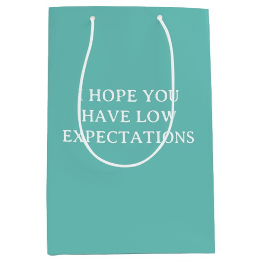 期待の低いユーモアおもしろい ミディアムペーパーバッグ (正面)