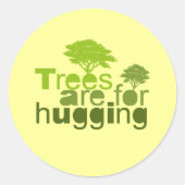 木々はTシャツを抱き込む/アースデイTシャツ ラウンドシール (正面)