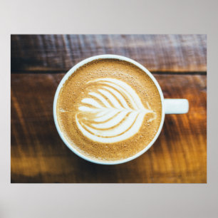 木に葉状の泡を付けたコーヒーラテカップ ポスター