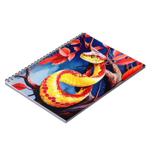 木に赤鮮やかと黄色のはかりで測コブラ ノートブック (左側)