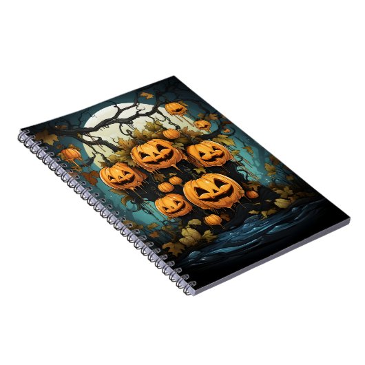 木の上のぶら下がったハロウィーン屋外のカボチャ ノートブック (右側)