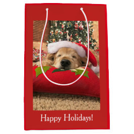 木の下で眠ったクリスマスのゴールデン・リトリーバー犬 ミディアムペーパーバッグ