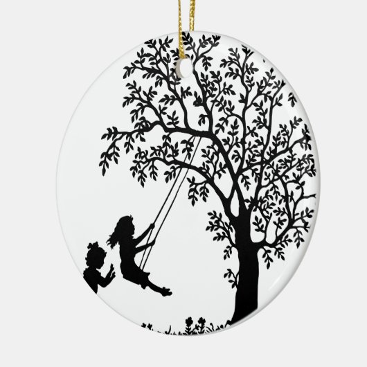 木の振動で振れていたり及び花を選んでいる3人の女の子 セラミックオーナメント (左)