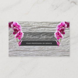 木の茂みに咲く美しい紫のピンクの蘭 名刺