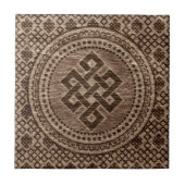 木の表面で装飾的な無限の結び目 タイル (正面)