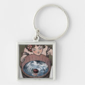 木樽を覗いている女性 キーホルダー (正面)